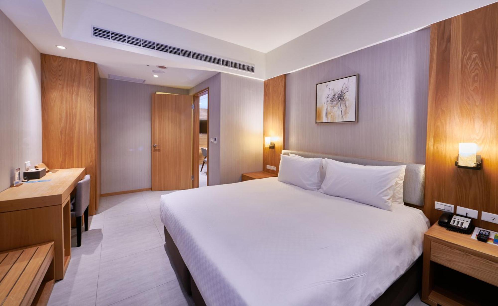 Grand Bay Resort Hotel Хенгчун Экстерьер фото A bedroom at the hotel